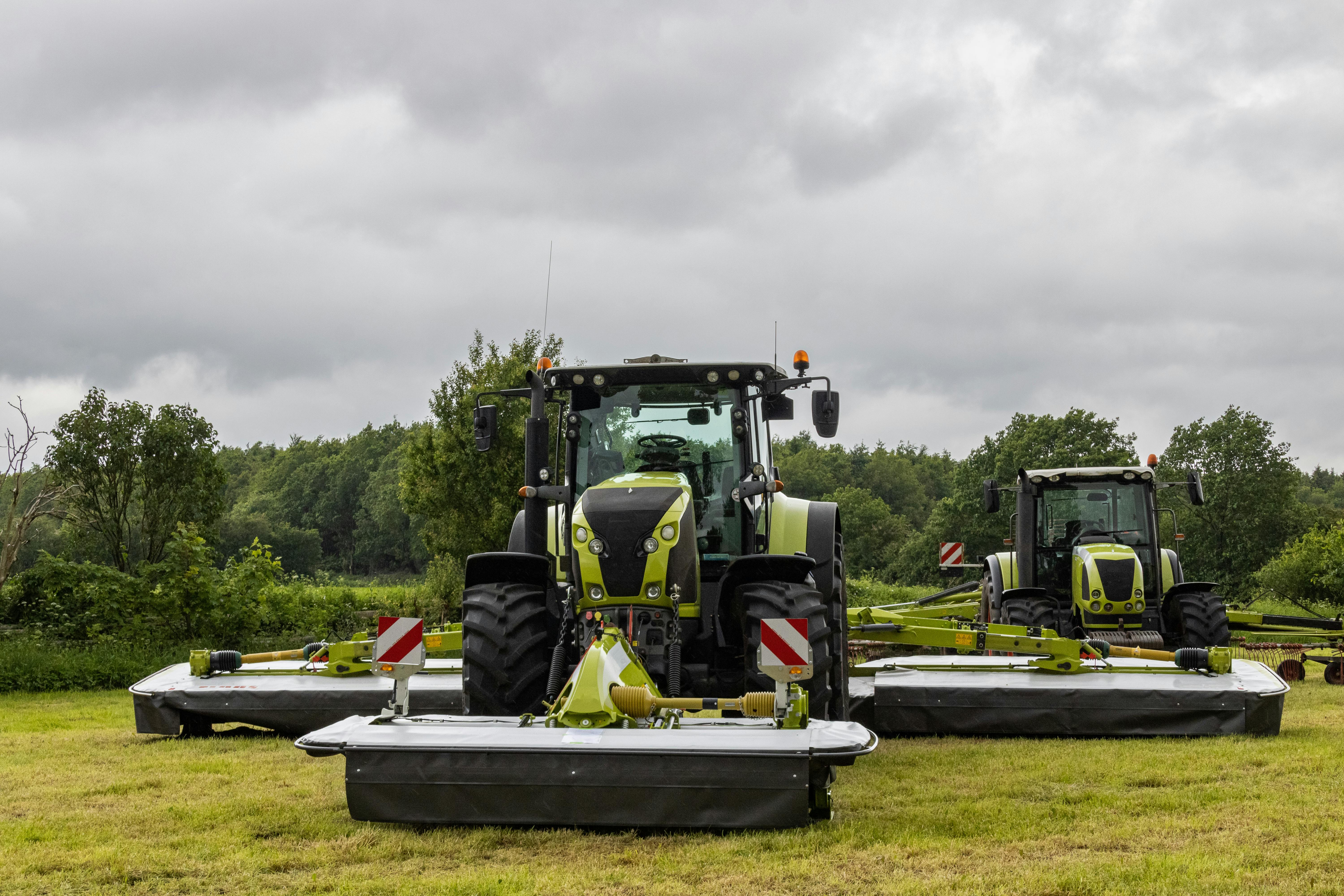 Tractors and agricultural machinery in a field